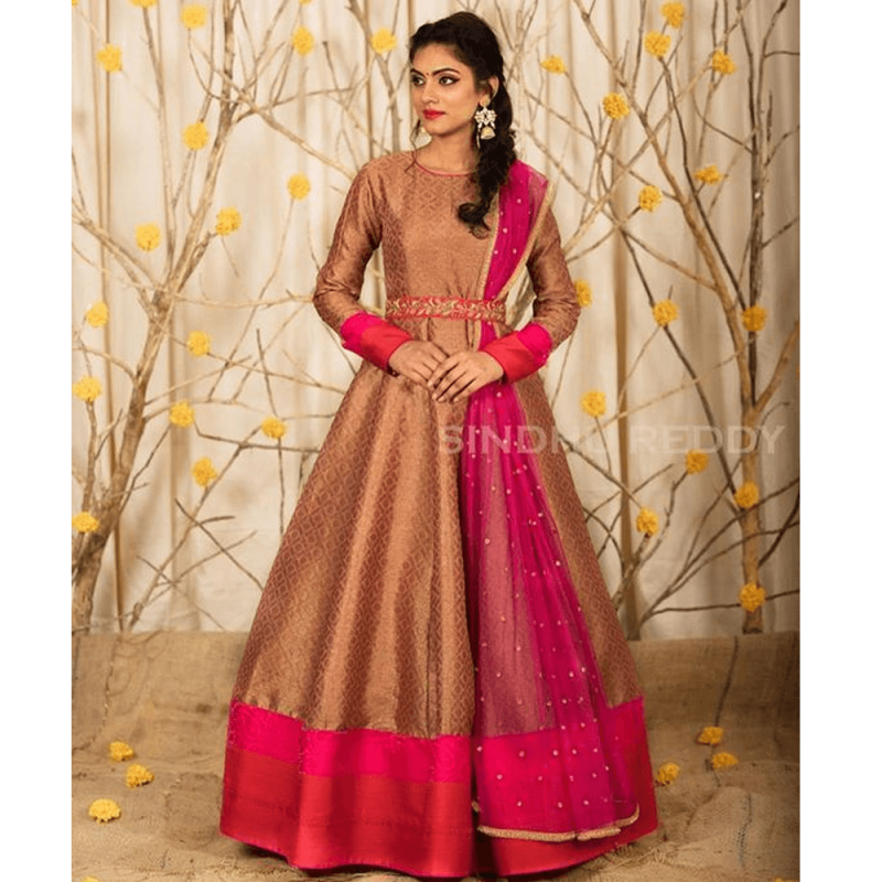 golden gown with red dupatta